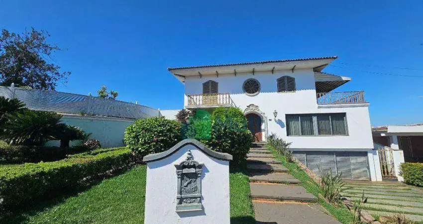 Casa de Alto Padrão Residencial/Comercial localizada no Bairro Ribeirânia, terreno de 1703m² e 862,73m² de área construída, 6 suítes.