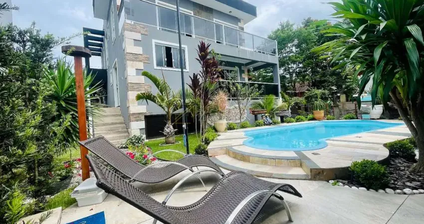 Casa 4 suítes com piscina e lago artificial condomínio fechado em florianópolis praia dos ingleses