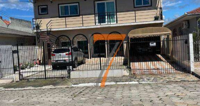 Casa com 4 dormitórios para alugar, 240 m² por R$ 6.316,78/mês - Serraria - São José/SC