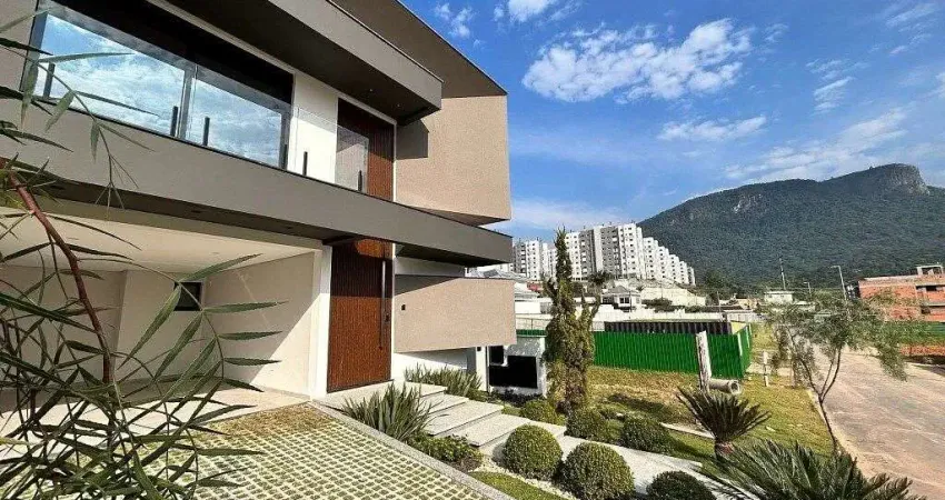 Casa com 3 suítes, piscina e área gourmet à venda no Reserva da Pedra, Palhoça