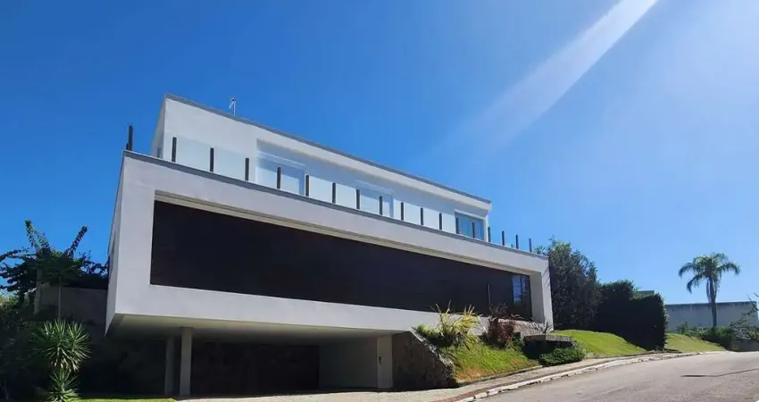 Casa com 4 suítes à venda em condomínio no Cacupé, Florianópolis