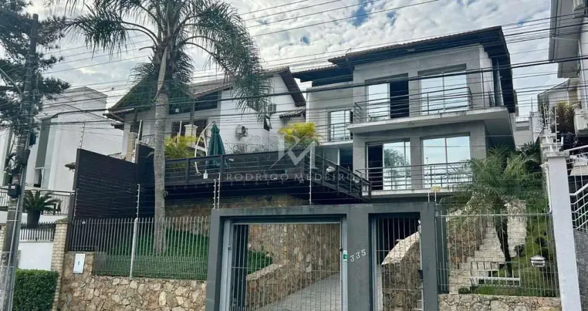 Casa com 3 suítes de frente para o lago na Pedra Branca, Palhoça