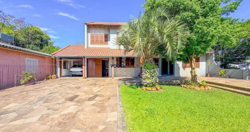 Sobrado com amplo pátio e 4 dormitórios no bairro nossa senhora das graças - canoas.