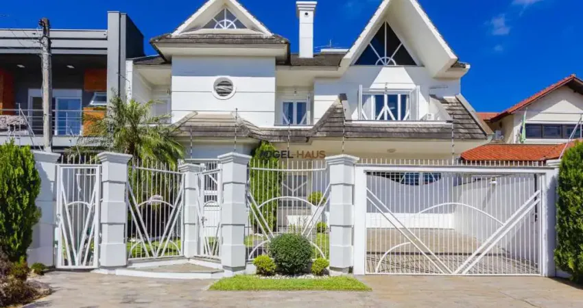 Casa 4 suítes com piscina, bairro Moinhos de Vento - Canoas.