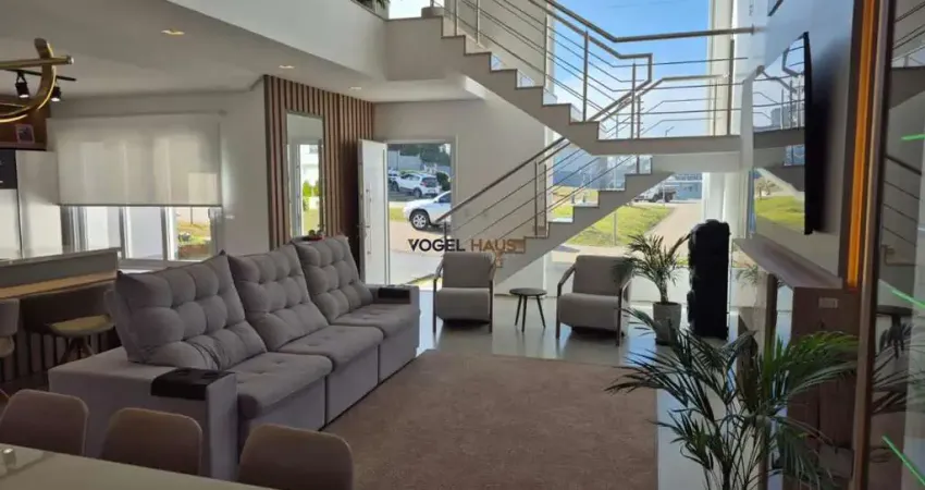 Casa em condomínio fechado reservas do lago, em nova santa rita.