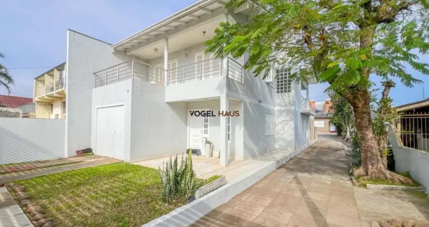 Casa com 4 dormitórios à venda, bairro Niterói - Canoas.