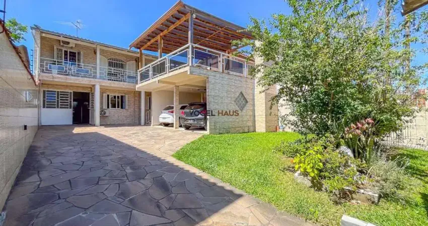 Sobrado com 4 dormitórios sendo 1 suíte. bairro estância velha - canoas.