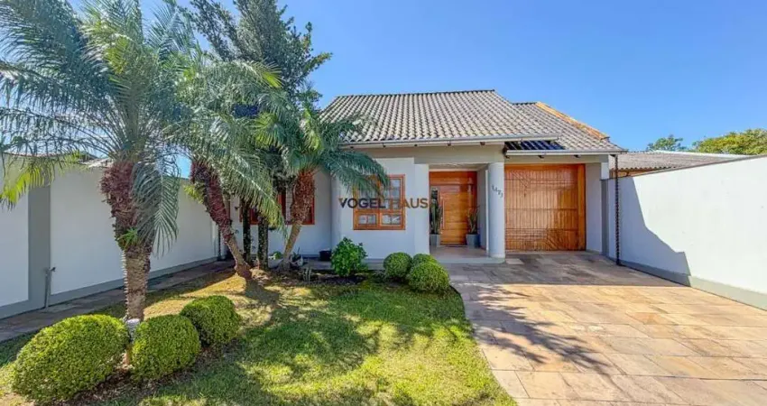 Casa térrea com 4 dormitórios e com piscina no bairro niterói - canoas.