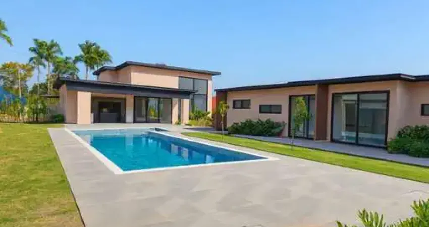 Luxuosa residência no condomínio fazenda vila real – 5 suítes e lazer completo