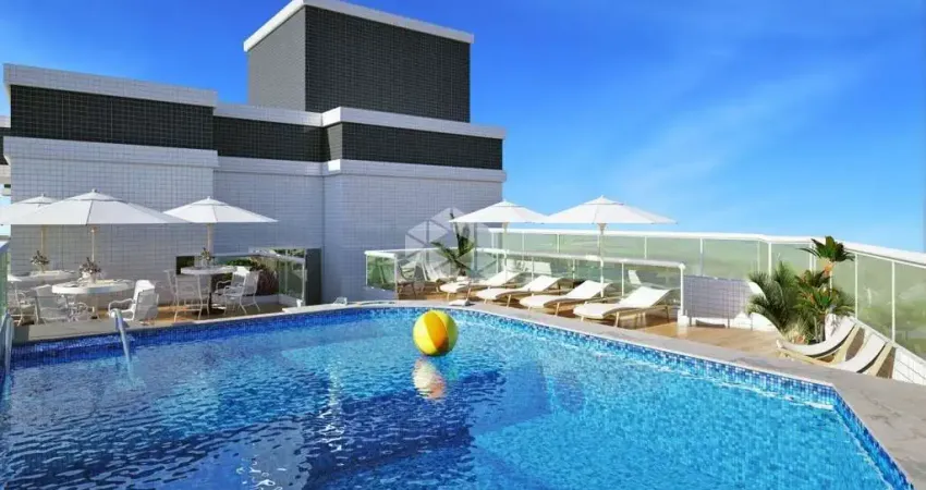 APARTAMENTO 01 DORMITÓRIO, SACADA COM CHURRASQUEIRA, 01 VAGA. VILA MIRIM, PRAIA GRANDE SP.