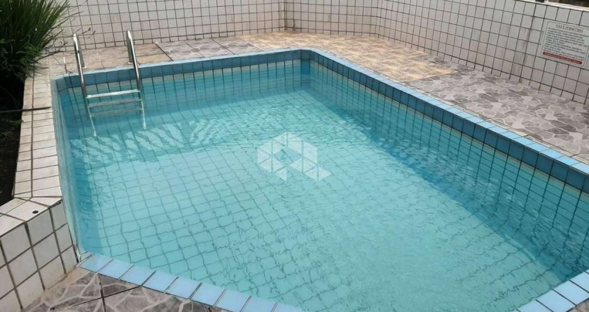 APARTAMENTO C/ QUINTAL NO TÉRREO, CONTENDO 01 DORMITÓRIO, PRÉDIO COM PISCINA E A POUCAS QUADRAS DA PRAIA DA OCIAN. PRAIA GRANDE SP.