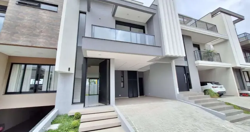 Santa cândida, casa em condomínio, nova, 3 quartos sendo 2 suítes, quintal com churrasqueira e 2 va