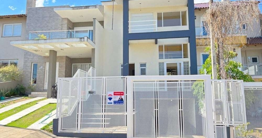 Casa à venda em Porto Alegre-RS, bairro Hípica: 3 quartos, 3 suítes, 4 banheiros, 2 vagas na garagem, 230m². Venha conferir!