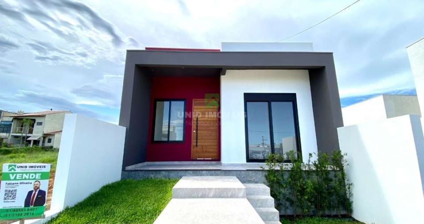 Casa térrea nova com 3 dormitórios sendo 1 suíte, living 2 ambientes, área de serviço fechada, banheiro social, pé direito auto, piso porcelanato de a