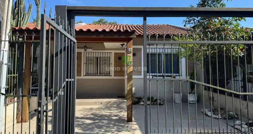 Casa à venda em Porto Alegre-RS, bairro Hípica: 2 quartos, 1 sala, 1 banheiro, 1 vaga de garagem, 135m² de área.