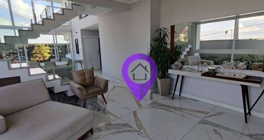 Casa à venda em Santa Rita, Pouso Alegre/MG. 350m² construídos, 3 dormitórios (1 suíte), 4 vagas, hidromassagem e área gourmet.