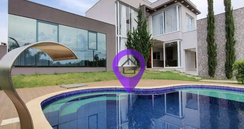 Casa contemporânea de 235m² no Condomínio Las Palmas, Pouso Alegre. 4 dormitórios, suíte máster, piscina com hidromassagem.