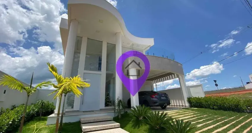 Casa de 250m² à venda no condomínio Las Palmas em Pouso Alegre. 3 suítes com varanda, piscina com hidromassagem e arquitetura moderna