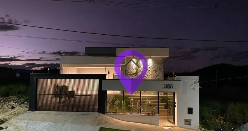Casa à venda no Residencial Astúrias, Pouso Alegre/MG. 180m² construídos, 3 dormitórios (1 suíte), 4 vagas, área gourmet e amplo quintal com vista