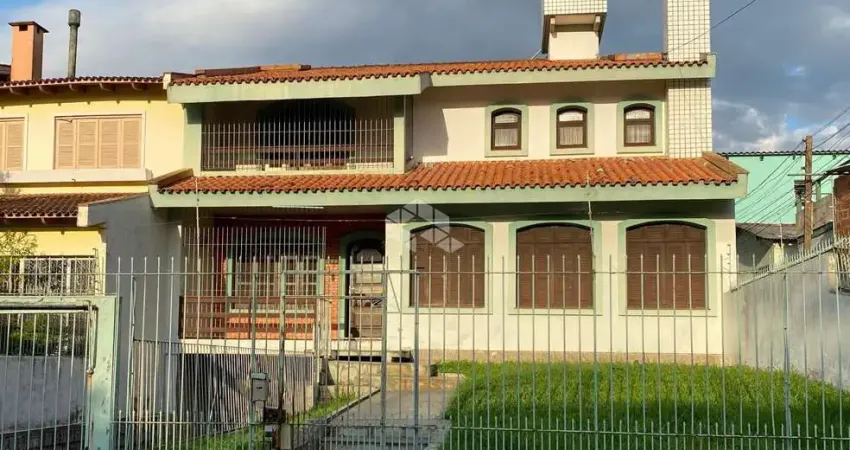 Casa com 5 quartos à venda na Rua Jaguari, 748, Cristal, Porto Alegre