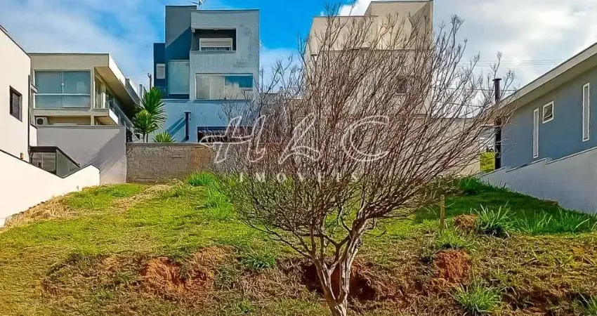 Terreno à venda no condomínio terras de genova - lote em declive.
