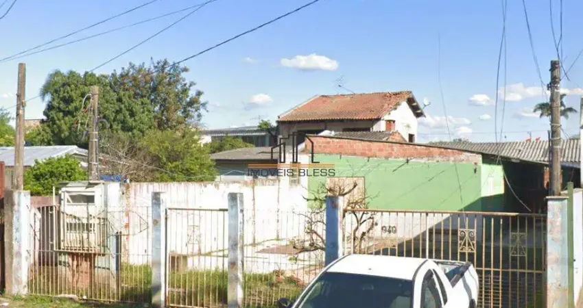 Terreno com duas casa no pátio localizado no bairro harmonia/canoas