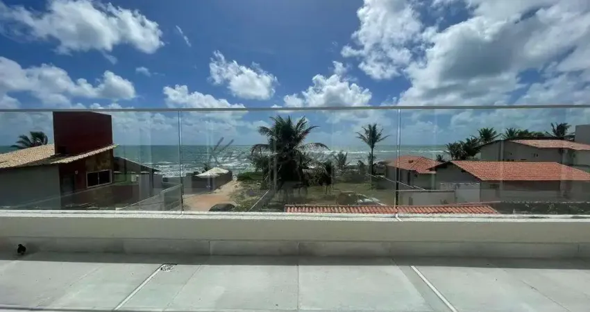 Casas conectadas de frente para o mar na Praia de Tabatinga