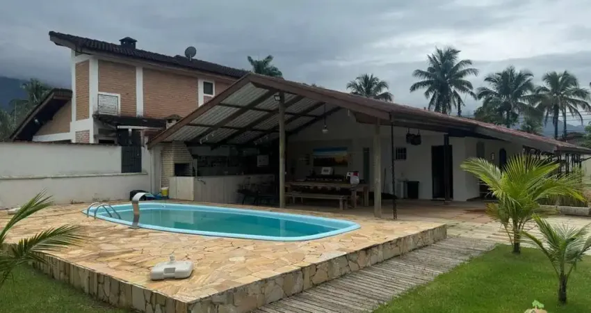 Casa  à Venda em Bertioga/SP - Morada da Praia: 4 Quartos, Piscina, Jacuzzi e Mais!