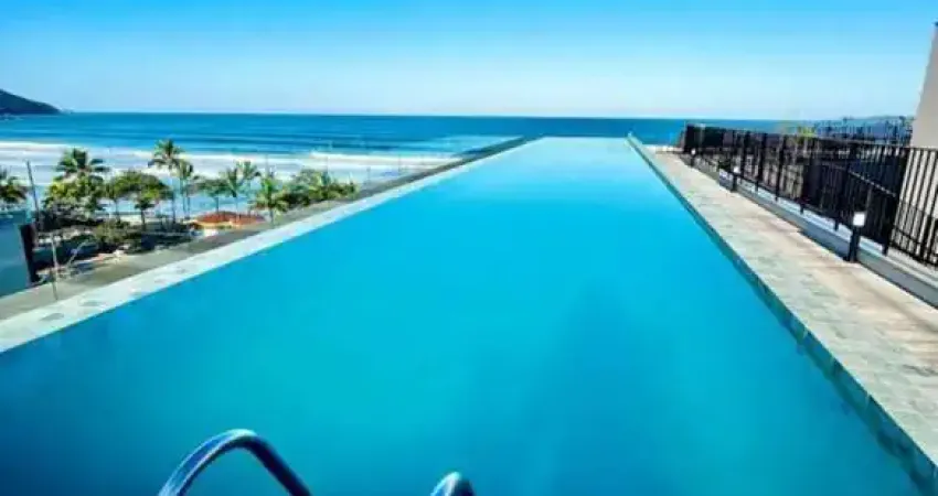 Lindo apartamento frente mar na praia grande com piscina no rooftop