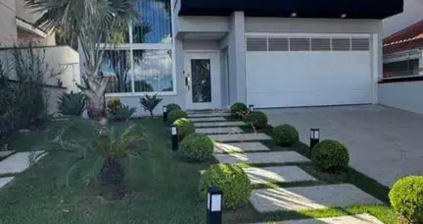 Casa com 3 dormitórios à venda, 240 m² por R$ 3.500.000,00 - Condomínio V - Arujá/SP