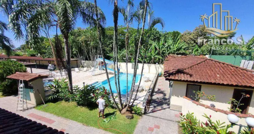 Village com 2 dormitórios à venda por R$ 400.000 - Centro - Bertioga/SP