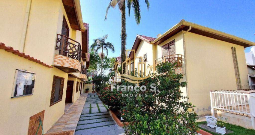 Village com 2 dormitórios à venda por R$ 520.000,00 - Maitinga - Bertioga/SP