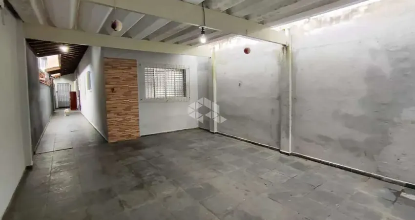 Casa Geminada a venda na praia grande, no bairro tupi, com 2 dormitórios, 1 Suíte e 2 vagas