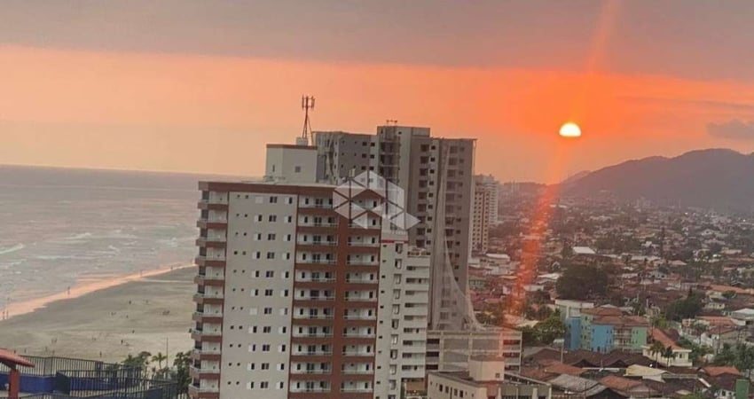 apartamento a venda na praia grande, bairro real, com 2 quartos, 1 suite e 1 vaga