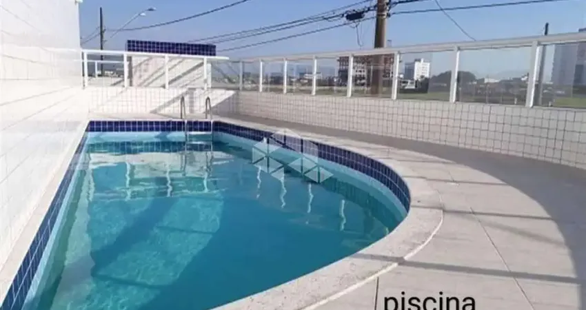 Apartamento a venda na praia grande, na guilhermina, com 2 dormitórios, 1 suite e 1 vaga