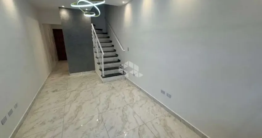 Sobrado novo a venda no bairro real, praia grande, com 3 quartos, 1 suite e 1 vaga independente