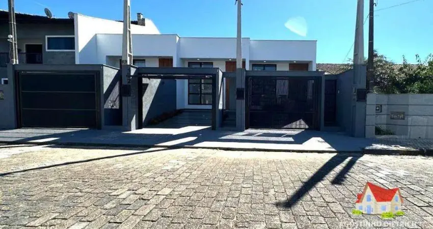 Casas geminadas terreas c/02 quartos c/suite + vaga de garagem + espaco aos fundos c/churrasqueira no bairro iririu!