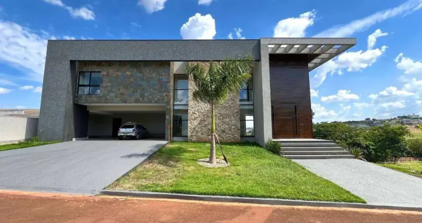 Casa com 4 dormitórios à venda, 553 m² por R$ 3.890.000,00 - Condomínio Costa do Sol - Rolândia/PR