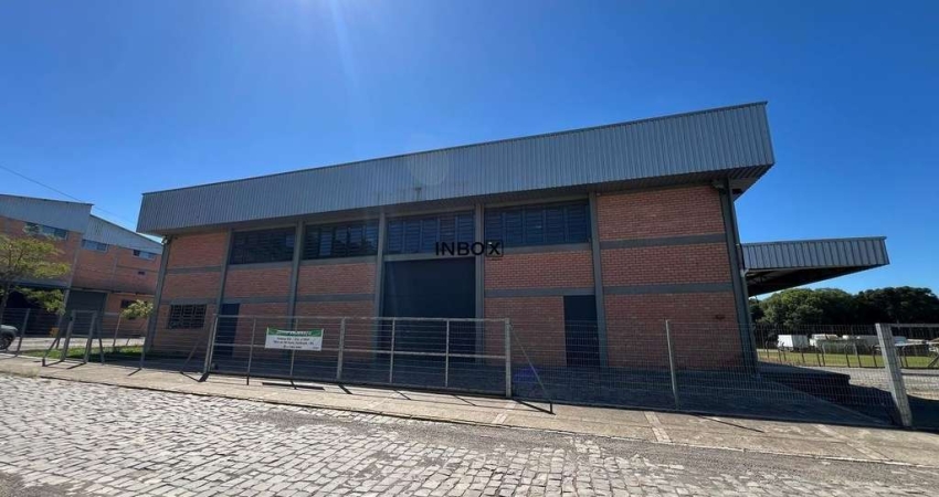 INBOX CIA IMOBILIÁRIA ALUGA - Pavilhão com docas e pátio cercado.