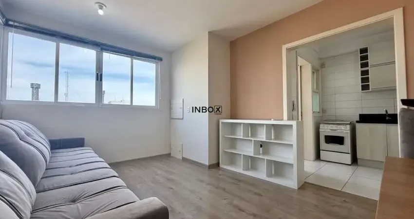 Inbox cia imobiliária aluga - apartamento semi-mobiliado de um quarto com um box de garagem.