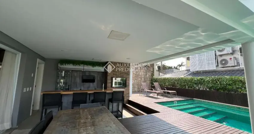 Casa em condomínio fechado com 4 quartos à venda na Rodovia Admar Gonzaga, 3180, Itacorubi, Florianópolis
