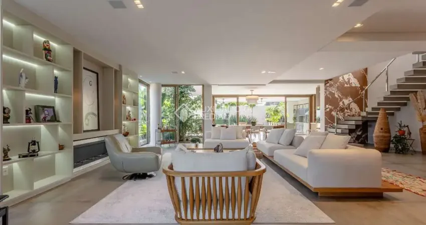 Casa em condomínio fechado com 4 quartos à venda na Rodovia Haroldo Soares Glavan, 1760, Cacupé, Florianópolis