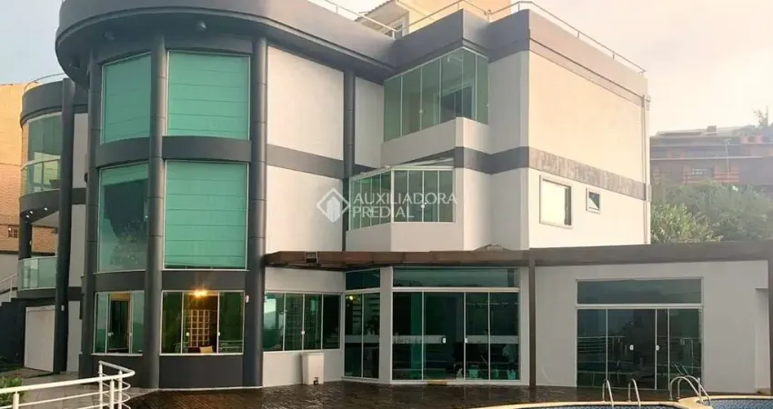 Casa em condomínio fechado com 4 quartos à venda na Rua das Azaléias, 1444, Bosque das Mansões, São José