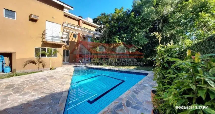 Casa de luxo à venda em Caraguatatuba-SP, Massaguaçu: 3 quartos, 3 suítes, 3 salas, 5 banheiros, 3 vagas de garagem, 400m².