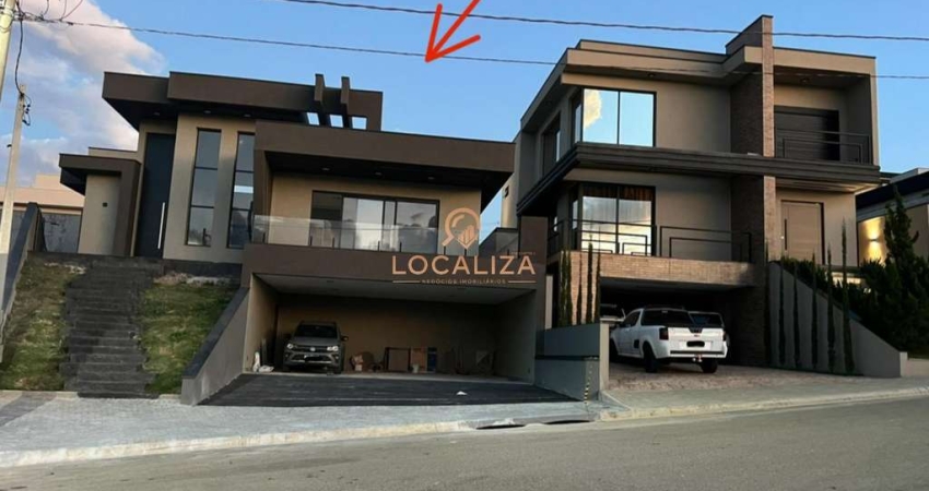 Casa à venda em Caçapava-SP, Residencial Colinas: 3 suítes, área de lazer, 4 vagas. Aproveite essa oportunidade única!