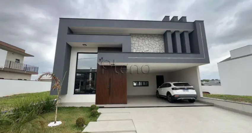 Linda casa em indaiatuba, construção recente, três suítes, escritório, jacuzzi e aquecimento solar localizada no condomínio park gran reserve