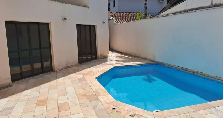 Casa em condomínio fechado com 3 quartos para alugar no Balneário Praia do Pernambuco, Guarujá 