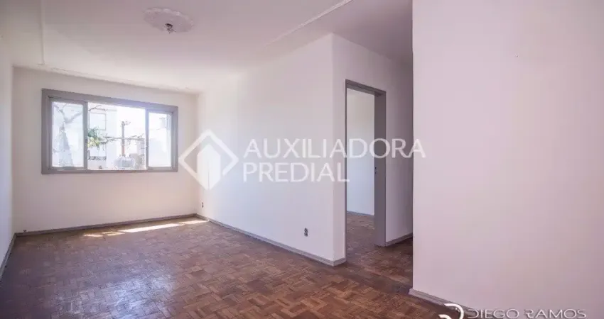 Apartamento com 2 quartos, frente , com 1 vaga de garagem , próximo do centro