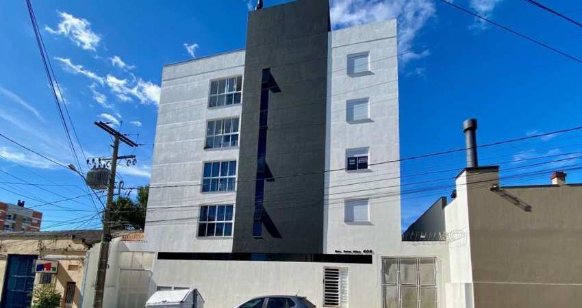 Apartamento 2 dormitórios, sacada com churrasqueira, 1 vaga de garagem no Bairro