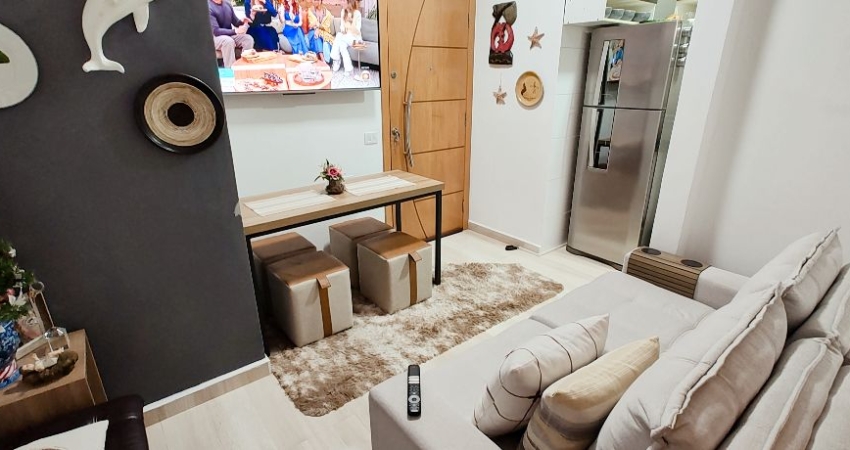 VENDA DE SALA LIVING DE 34m2 ( sem elevador ) condomínio baixo E VAGA DE GARAGEM COLETIVA INSUFICIENTE NA PONTA DA PRAIA EM SANTOS-SP